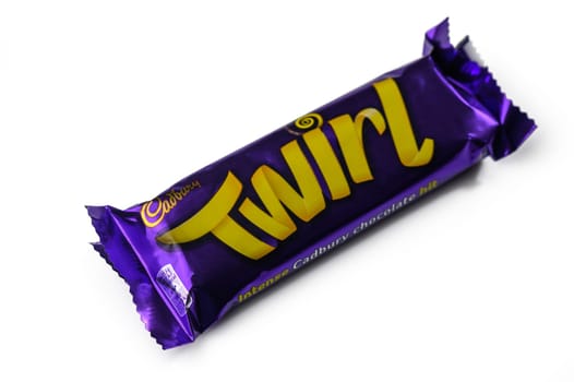 Gaziveren Cyprus -15.02.2025 A delicious chocolate bar wrapped in vibrant purple foil invites sweet lovers to indulge in its rich taste.