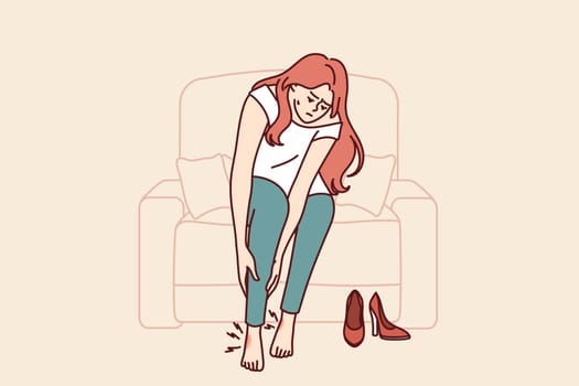 Woman suffers from pain in legs or varicose veins due to use of uncomfortable shoes with high heels. Girl with callus on feet is in pain after wearing shoes for long time at work or party
