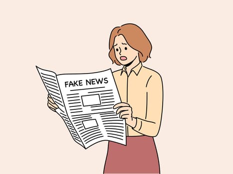 Newspaper with fake news in hands of woman reading false information from reporters using propaganda techniques to intimidate readers. Girl with newspaper with fake news frightened opens mouth