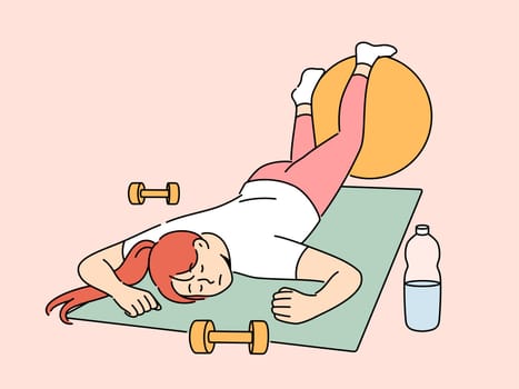 Exhausted woman in fitness room fell asleep on sports yoga mat and needs to rest after workout. Lazy girl sleeps in fitness club, not wanting to do athletics and listen to advice of personal trainer