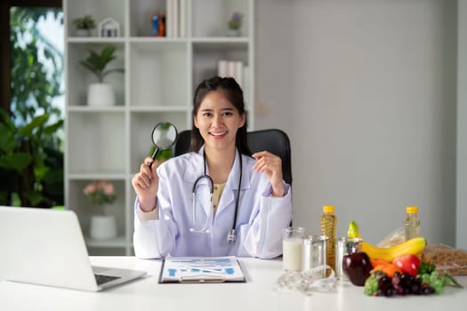 A nutritionist uses a magnifying glass to evaluate food items, representing a hands-on approach to nutritional research and quality assessment.