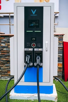Modern energy charging station Vinfast for charges electric cars in Vietnam. Nha Trang, Vietnam - December 18, 2024