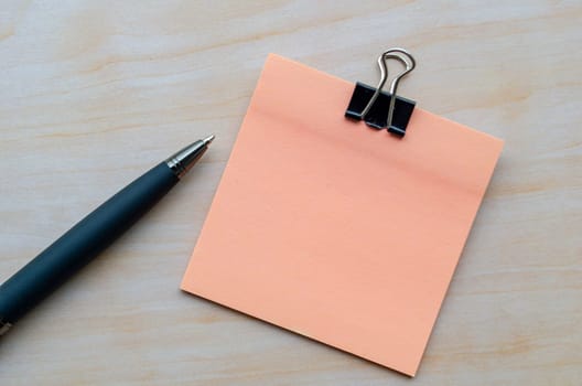 Top view of light pink color notepad with customizable space for text.