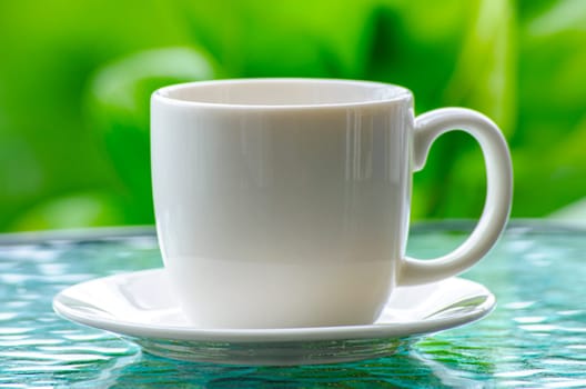 Close up of white cup with customizable space for mockup. Copy space and mockup concept.