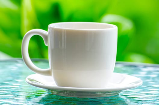 Close up of white cup with customizable space for mockup.