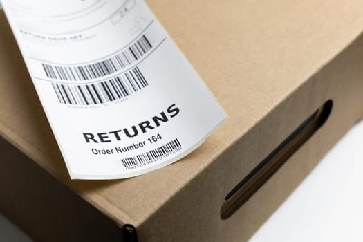 Return label with barcode for returning a parcel. Copenhagen, Denmark - March 15, 2025