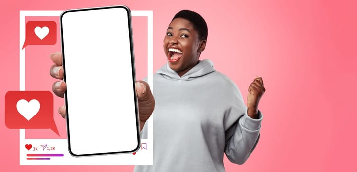 An enthusiastic influencer holds a smartphone, displaying a blank screen for social media interactions. With a vibrant background, she appears ready to engage online and share content.