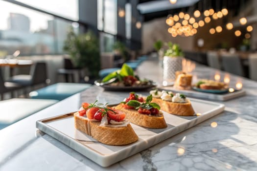 Colorful bruschetta topped with fresh ingredients sits on a marble table in a stylish eatery. The ambient lighting and decor create a welcoming atmosphere for diners enjoying lunch.