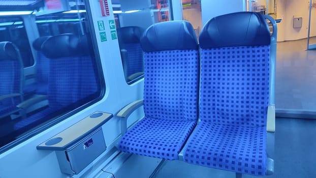 October 17 2024 Bad Schandau Czech Republic Europe , Train blue seats travel tourism transport shotlisttravel indoor design interior furniture objects . High quality photo