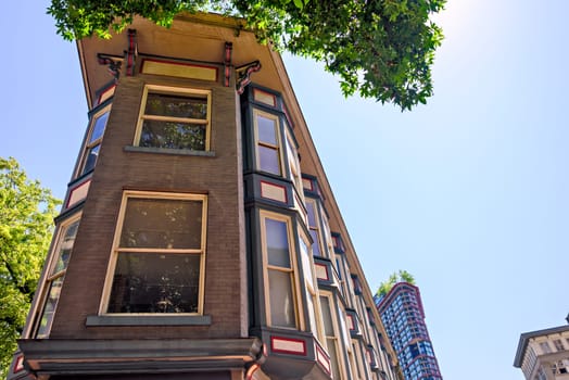 Small flatiron building in Gastown, downtown of Vancouver, British Columbia.