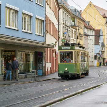 Wurzburg, Germany – September 26, 2024: The Schoppenexpress, a party train, Partybahn operated by Wurzburger Straßenbahn GmbH, traveling through Wurzburg