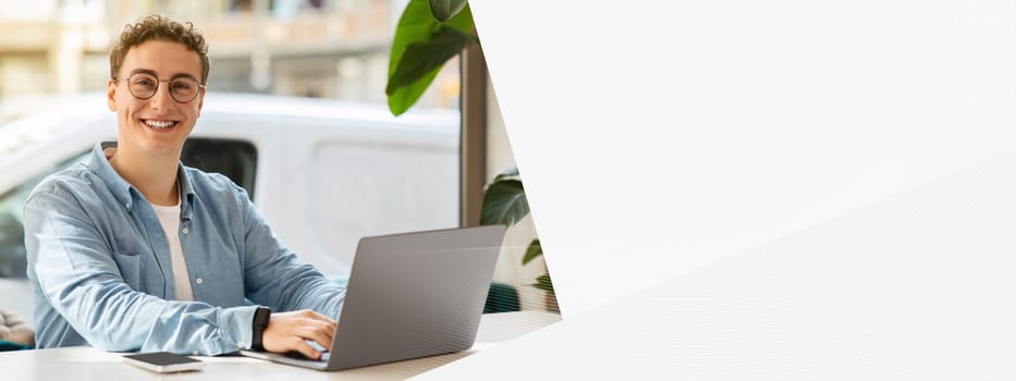 Smiling proud millennial european guy student in glasses, typing on computer, work, study online, chatting in cafe. Online meeting, lifestyle remotely, digital nomad, freelance