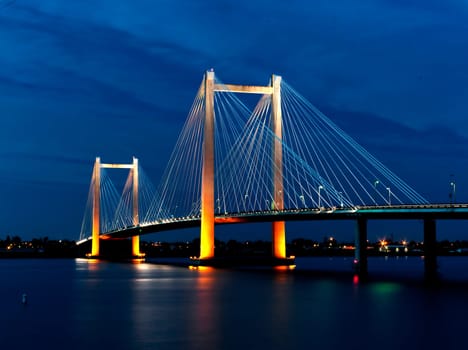 Evening shots of Benton Franklin intercounty bridge lit up over the Columbia River in Kennewick, Washington.
