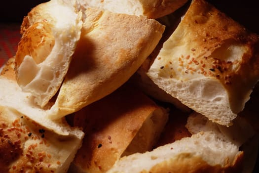 Soft bread pieces arranged together showcasing a golden crust.