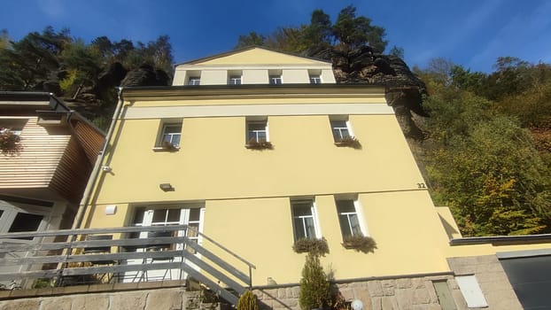 Yellow house hillside. High quality photo October 17 2024 Hrensko Czech Republic Europe
