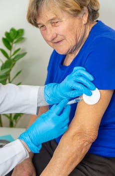 Elderly woman at a doctor appointment. Selective focus. People.