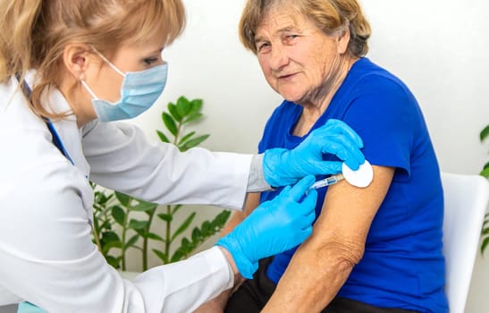 Elderly woman at a doctor appointment. Selective focus. People.
