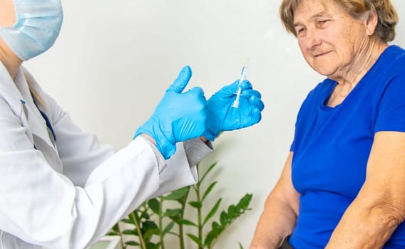 Elderly woman at a doctor appointment. Selective focus. People.