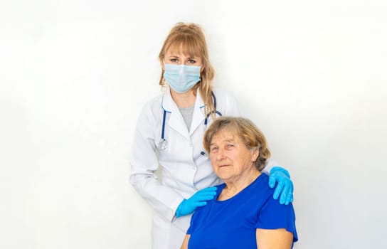 Elderly woman at a doctor appointment. Selective focus. People.