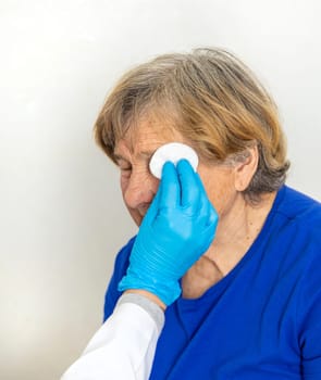 Elderly woman at a doctor appointment. Selective focus. People.