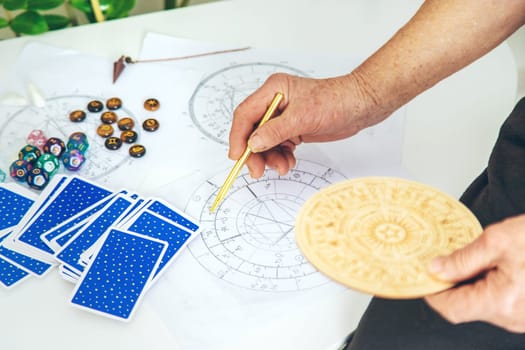 Astrology and fortune telling old fortune teller. Selective focus. people.