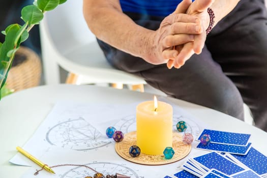 Astrology and fortune telling old fortune teller. Selective focus. people.
