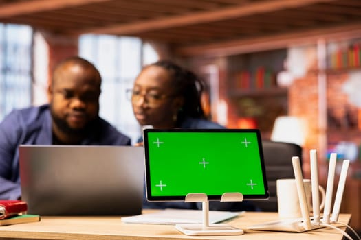 African American couple work as a team to fix their Wi-Fi setup next to copy space, troubleshooting router errors to maintain efficiency in their self employed careers. Weak internet connection.