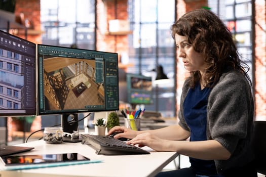 Architectural designer works on a digital home design project, using a 3D modeling program to arrange furniture. The software with advanced user interface for professional rendering.
