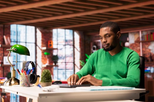 Remote employee in home office closing laptop after finishing catching up with emails. Teleworker ending job shift after being done with reading messages in inbox, preparing to leave workspace