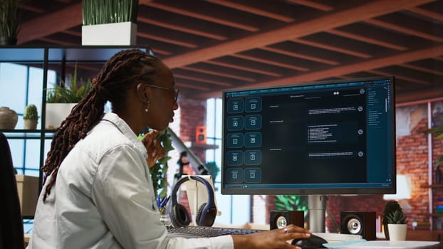 Student at home using AI LLM chatbot software to get help with solving homework. Girl requesting help from large language model program on computer device to do tasks, camera A