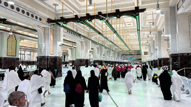Mecca, Saudi Arabia, May 2 2024: Muslim pilgrims performing Sa'i between Safa and Marwa during Hajj and Umrah in Mecca. A sacred Islamic ritual retracing Hajar's journey, set between two hills near Masjid al-Haram.