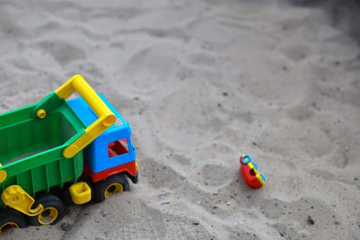 Playing Sand Truck on a Beautiful Beach . High quality photo