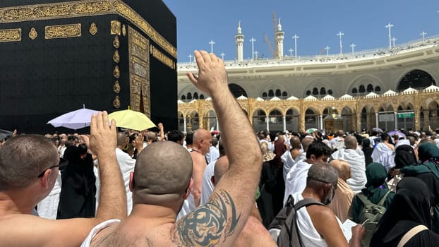 MECCA, SAUDI ARABIA - MAY 02 2024: View on Kaaba from second floor of Masjid Al Haram through some new constructions building around the masjid. High quality photo