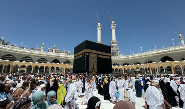 MECCA, SAUDI ARABIA - MAY 02 2024: View on Kaaba from second floor of Masjid Al Haram through some new constructions building around the masjid. High quality photo