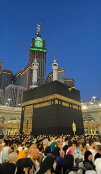 MECCA, SAUDI ARABIA - MAY 02 2024: View on Kaaba from second floor of Masjid Al Haram through some new constructions building around the masjid. High quality photo