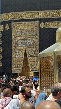 MECCA, SAUDI ARABIA - MAY 02 2024: View on Kaaba from second floor of Masjid Al Haram through some new constructions building around the masjid. High quality photo