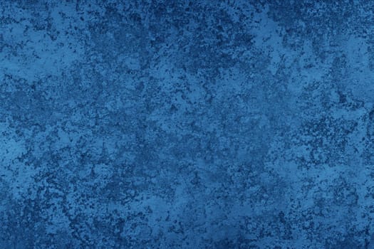 Abstract decorative dark blue plaster wall background