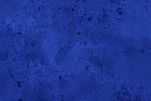 Abstract decorative dark blue plaster wall background