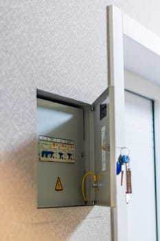 Open electrical switchboard in the apartment