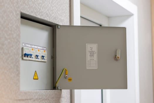 Open electrical switchboard in the apartment