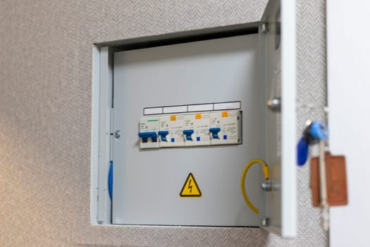 Open electrical switchboard in the apartment