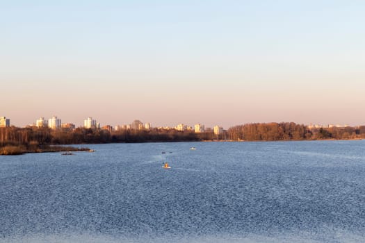 Group of people kayaking on the open water