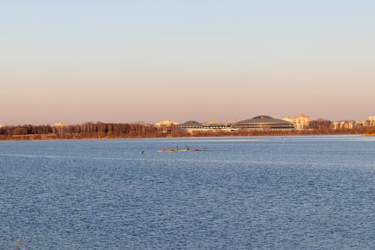 Group of people kayaking on the open water