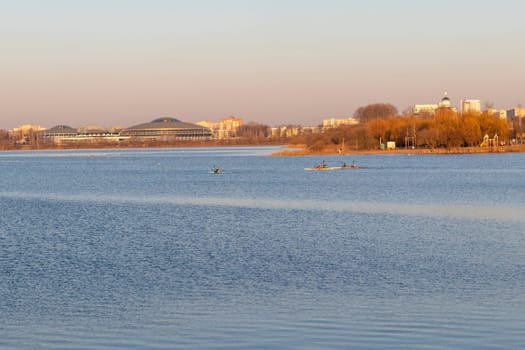 Group of people kayaking on the open water