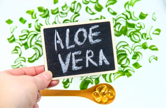Aloe vera capsules and extract drops. Selective focus. nature.