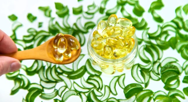 Aloe vera capsules and extract drops. Selective focus. nature.