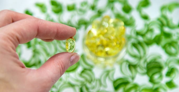 Aloe vera capsules and extract drops. Selective focus. nature.