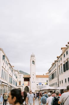 Tall ancient clock tower on the main street of Dubrovnik. Croatia. High quality photo