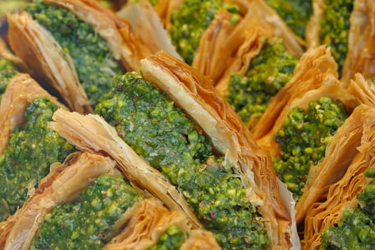 Freshly baked turkish balava with pistachios on top
