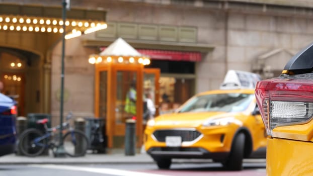 New York City, United States - 4 Sept 2023: Grand Central Terminal railway station, 42 street. Manhattan Midtown. Yellow taxi cab, cars on Pershing Square, USA. American urban road traffic and people.
